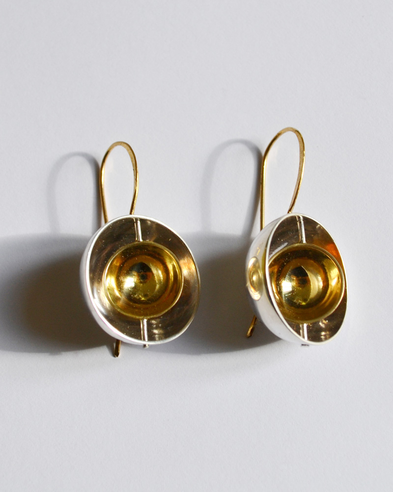 Earrings in gold and silver