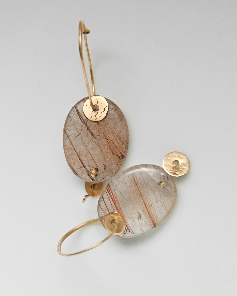 Earrings in gold and rutile quartz