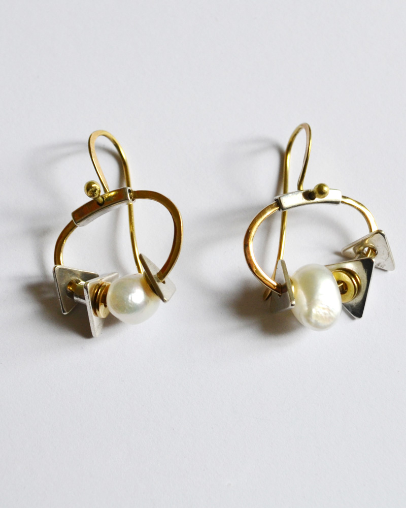 Earrings in gold and silver and pearls